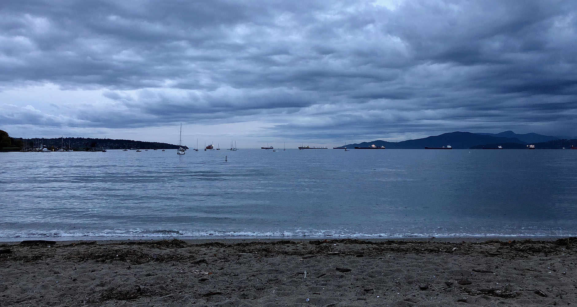 Sunset Beach at dusk in Downtown Vancouver, Canada